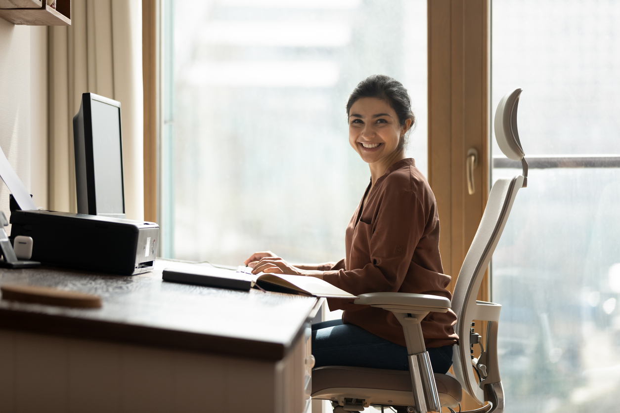 woman sitting at a desk